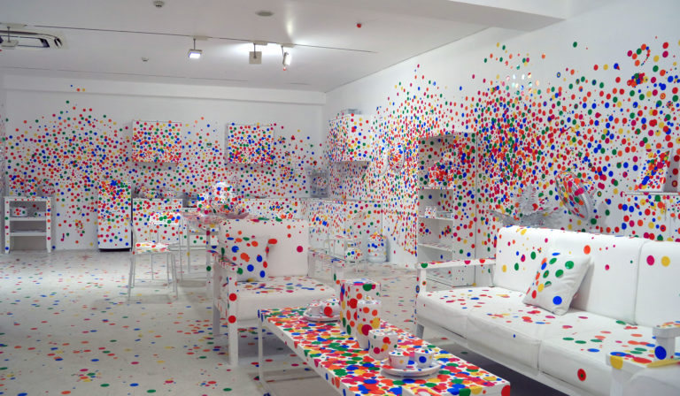 The Obliteration Room by Yayoi Kusama at the YAYOI KUSAMA: Life is the Heart of a Rainbow exhibition held at Museum of Modern & Contemporary Art in Nusantara (MACAN)