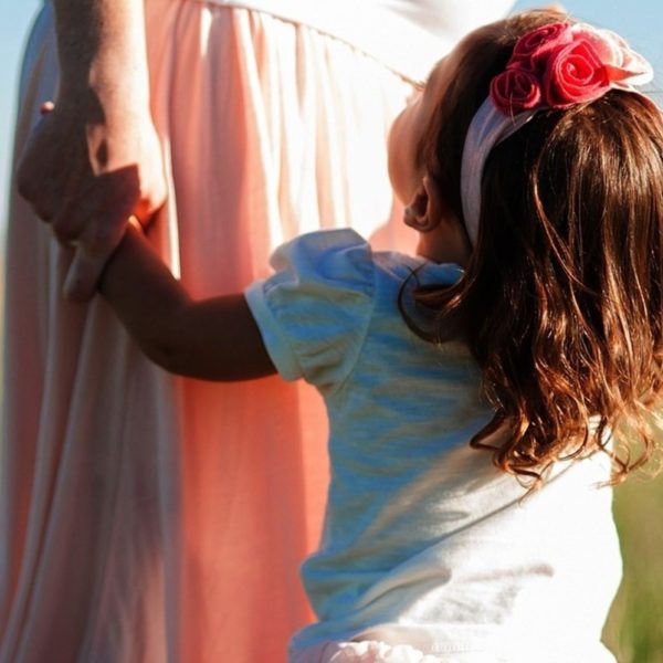 Girl Holding Hanged Laundry