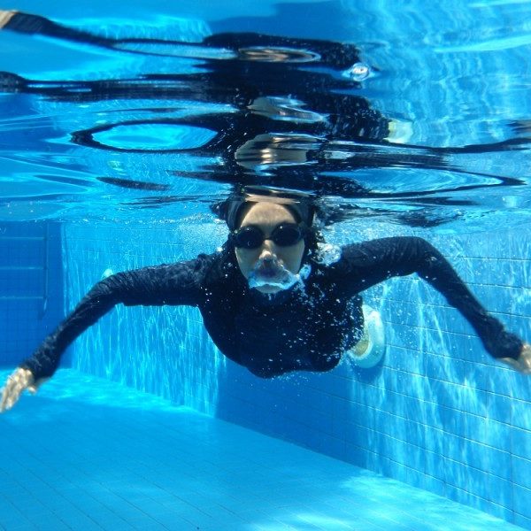 Domestic Helpers Learning To Swim At AquaDucks Singapore