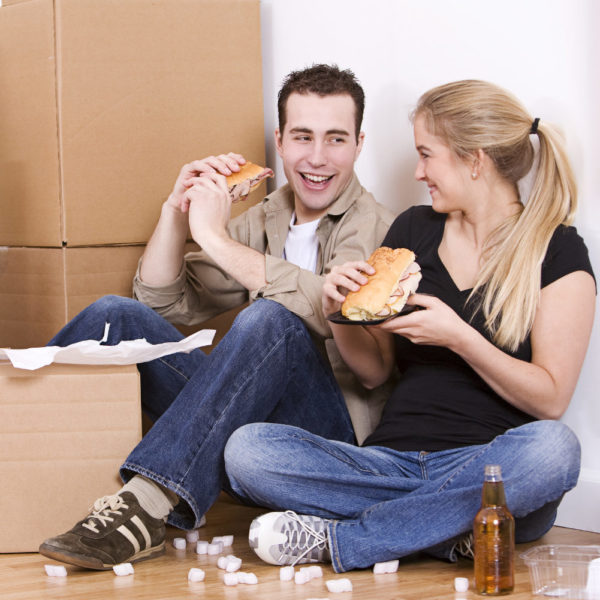 Couple Sitting On The Floor