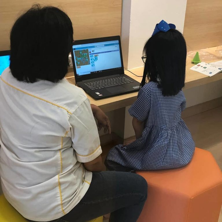 Little Girl Studying At Coding Bee