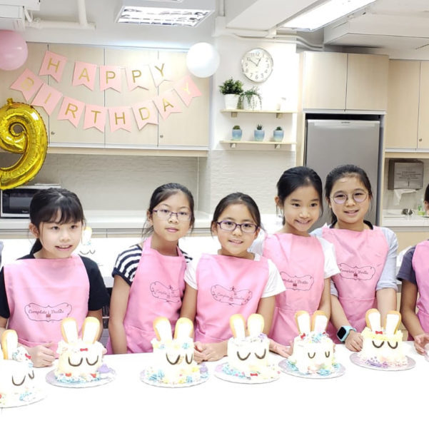 Kids At A Cooking Lesson At Complete Deelite Hong Kong