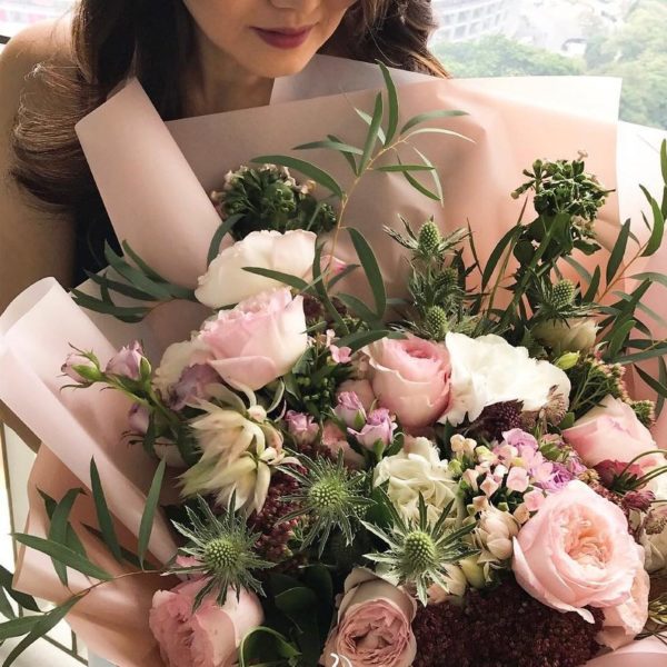 Woman Holding A Bouquet From Floe Flowers Jakarta