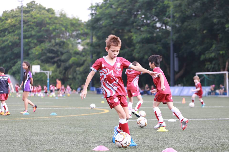Boy Kicking Ball ESF Football Hong Kong