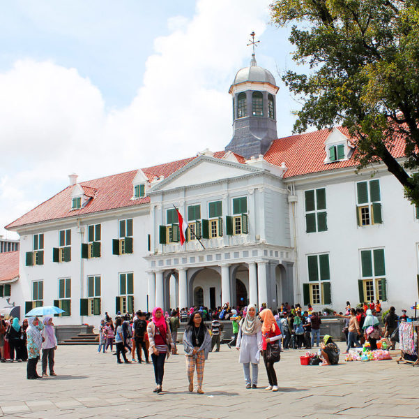 People Waling Outside Kota Tua Jakarta