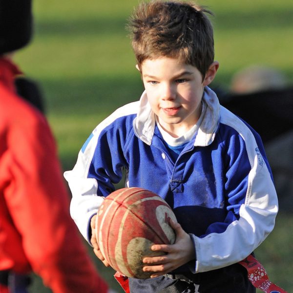 Boy Playing Rugby