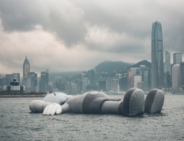 KAWS Gigantic Sculpture In Victoria Harbour In Hong Kong