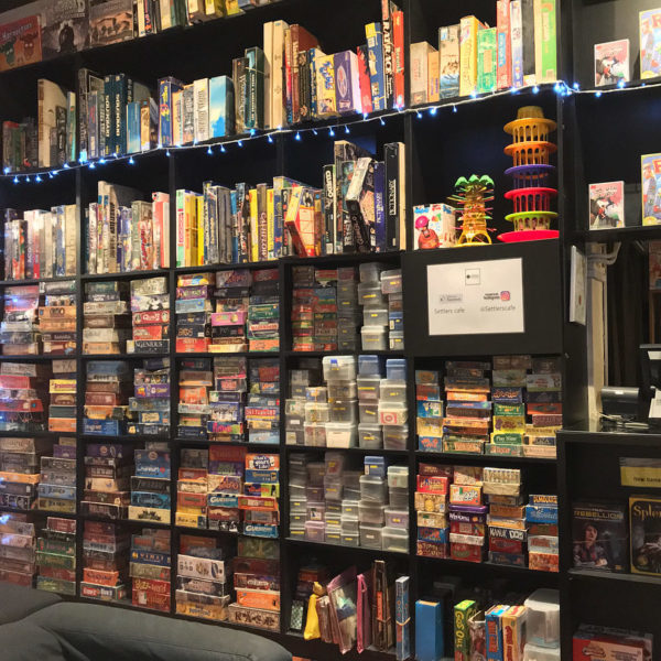 Shelf Of Games At Settler’s Café Singapore