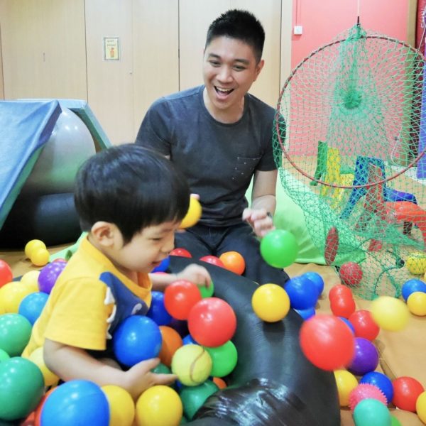 Child Playing In Ball Pit At Singapore Brain Development Centre