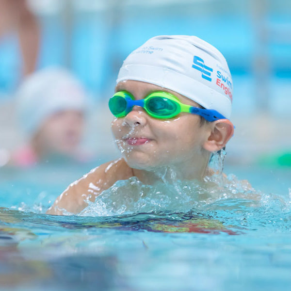 Child Swimming At The Jakarta AquaDragons Swimming Lessons