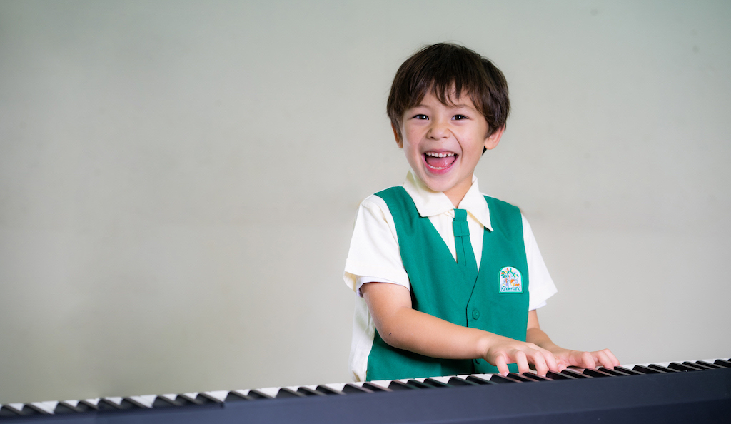 Playing Piano Kinderland Singapore