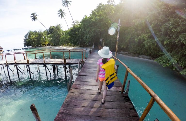 Girl Walking In Ora Beach Resort Indonesia Domestic Destination